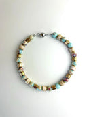 TURQUOISE STAINLESS STEEL TUBA